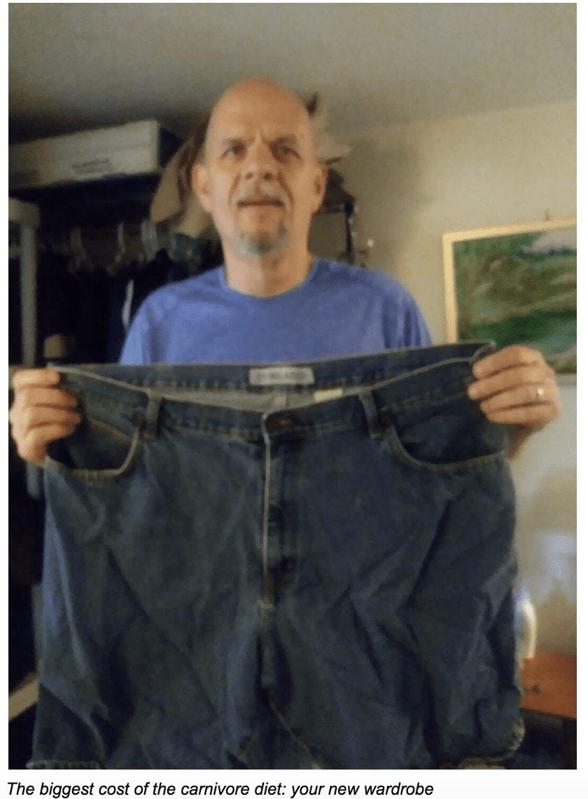 Brett Lloyd holding up his pant size 98 lbs heavier